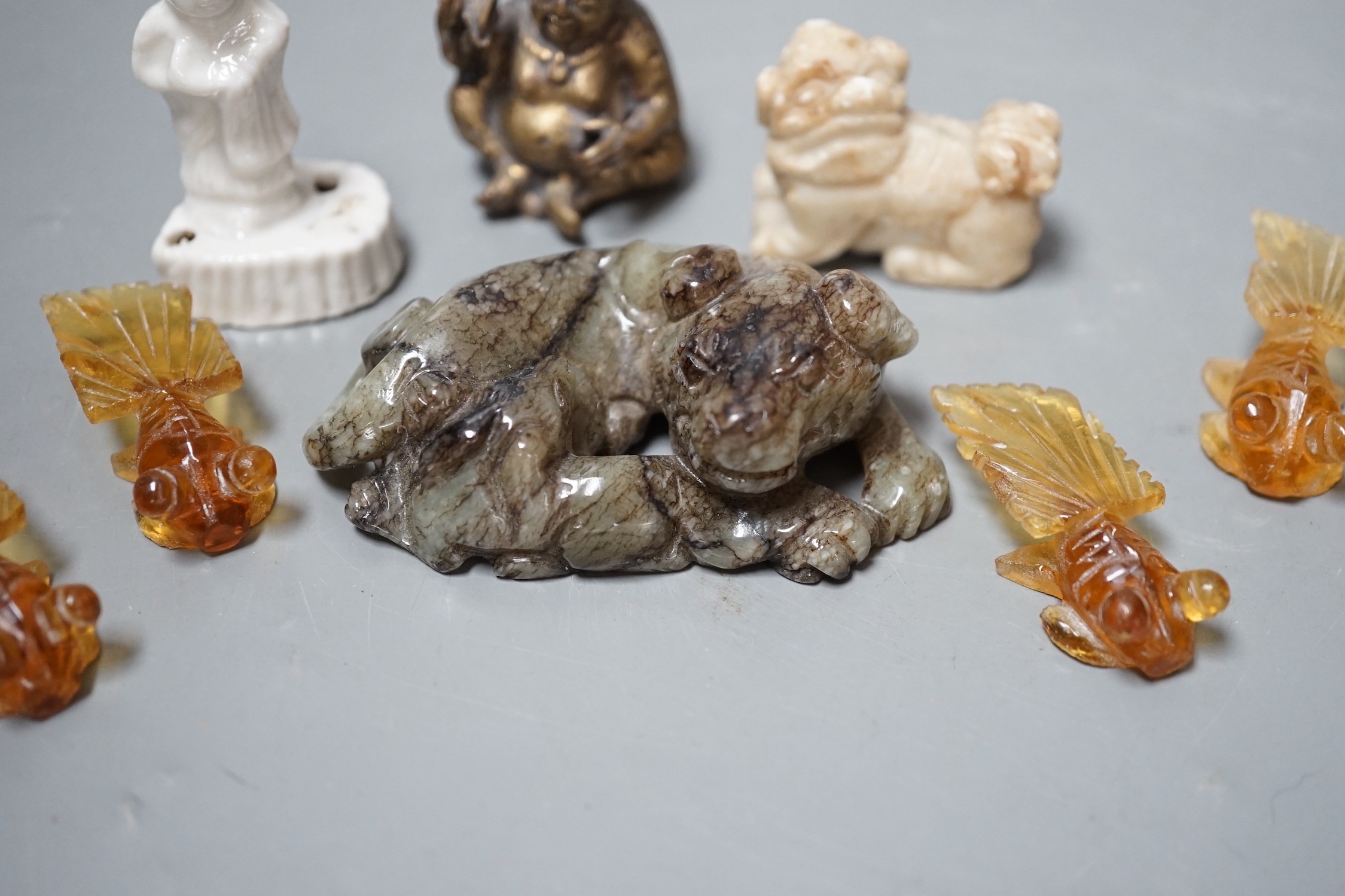 A group of Chinese jade, hardstone, faux amber carvings and models